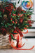 red and green flower bouquet