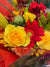 a bouquet of flowers sitting on top of a table