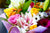 A bouquet of colorful flowers in a basket